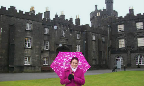 photo of a TWU student in front of an English castle