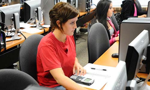 photo of a TWU student in a computer lab