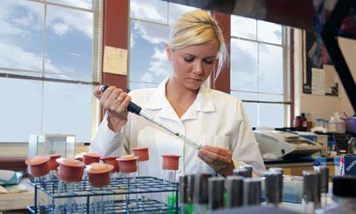 photo of a TWU student in a lab