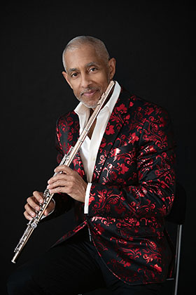 Nestor Torres poses with his flute.