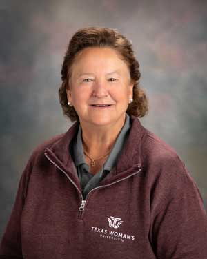 A headshot of Dianne Baker.