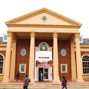 The front of the newly-refurbished Hubbard Hall with a grand opening banner hung over the entrance
