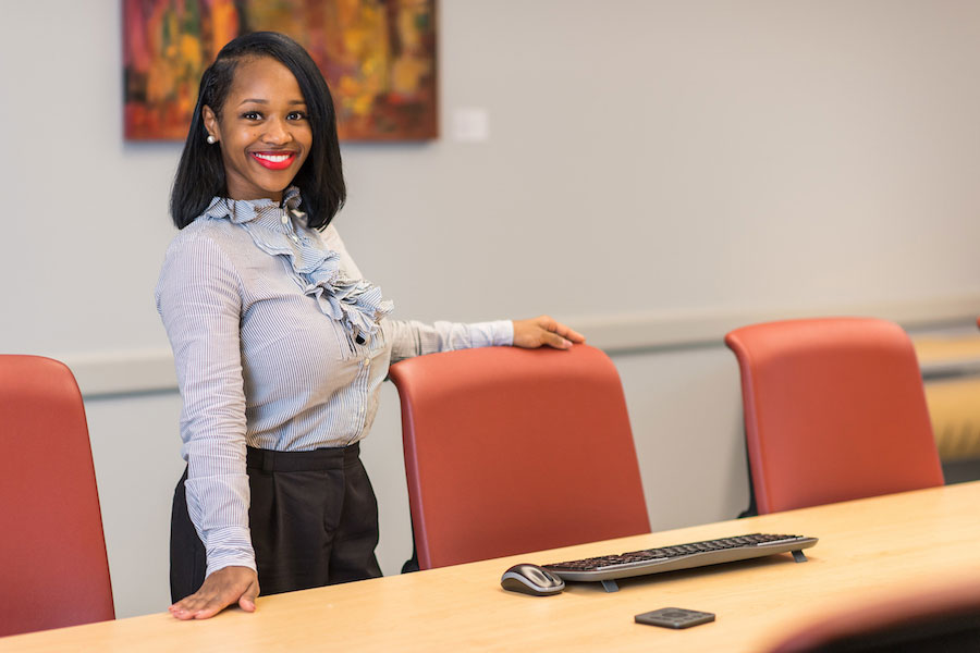 A TWU College of Business student dressed in professional attire