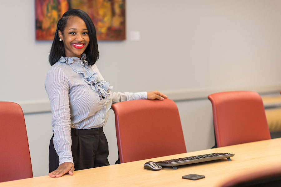 A TWU MBA Marketing student dressed in professional attire