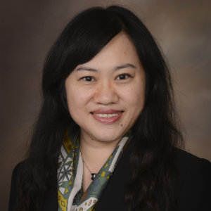 Smiling woman with long dark hair