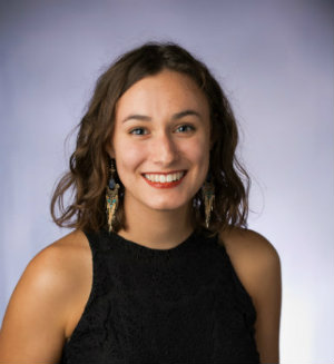 Smiling woman with long brown hair