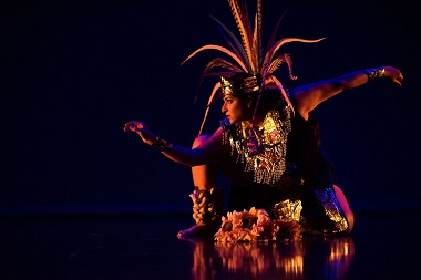 Elisa De La Rosa performing in costume onstage. Photo by Matthew Rood.