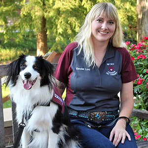 Portrait of Kendal Dickson and a dog