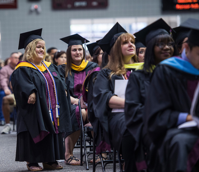 Christina Buce is recognized at a Spring 2018 graduation ceremony.