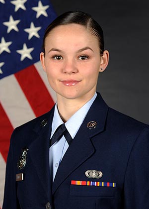 profile photo of Hannah Klim in Air Force uniform in front of American flag