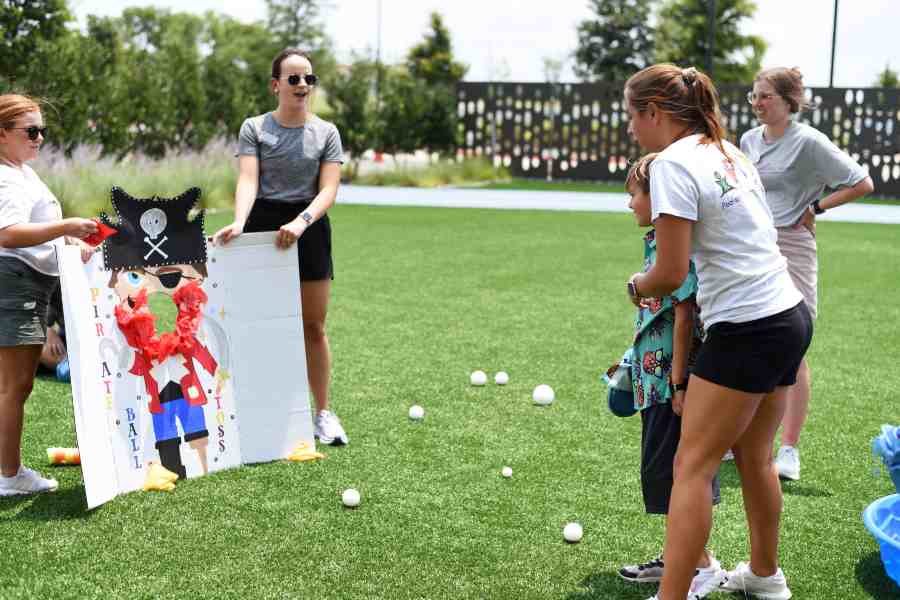 TWU occupational therapy students lead children with cerebral palsy through pirate-themed activities during Pirate Camp