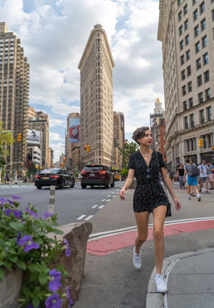 Morgan Villavaso walks through New York City on a summer day.