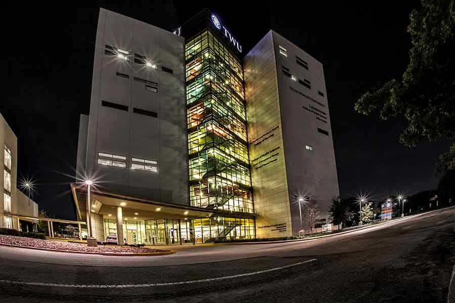 A view of TWU's Dallas campus at night.
