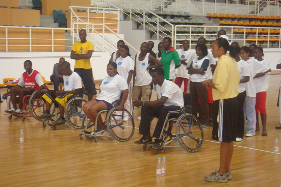 Agueda Gomes teaches a physical education class to students in wheelchairs in Africa.