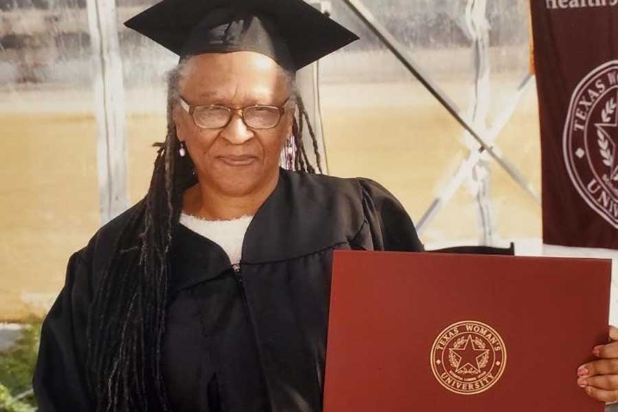 Edna Rawson in TWU academic regalia at the Texas Motor Speedway.