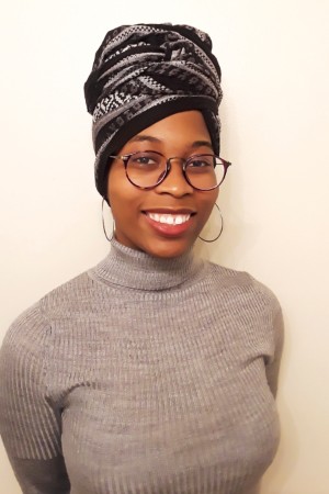 A headshot of Kayla Jones smiling.