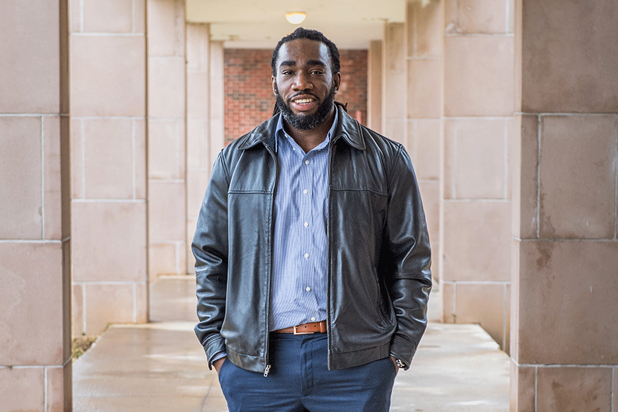 Ryan Matthews outdoors on TWU's Denton campus.	