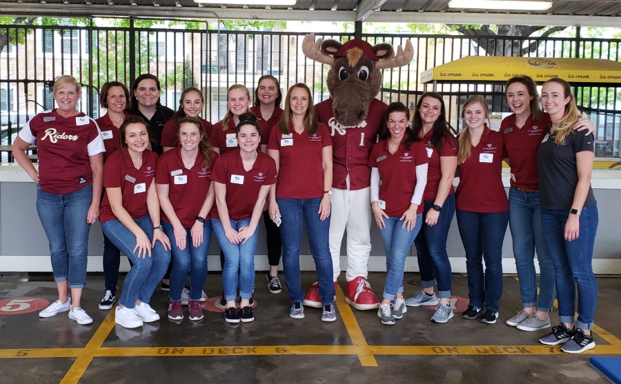 Group of TWU OT students help at RoughRiders Autism Awareness Night