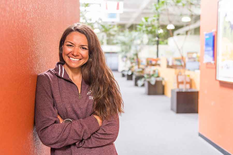 Roxanne Vogel smiles in an office setting.