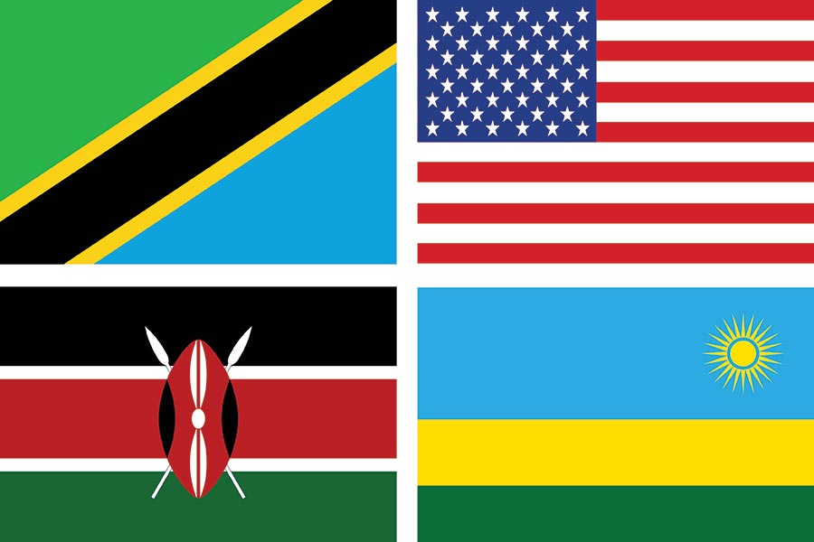 Flags of Tanzania, the United States, Kenya and Rwanda.