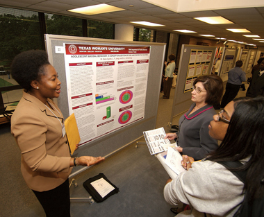 Student presenting research at a symposium