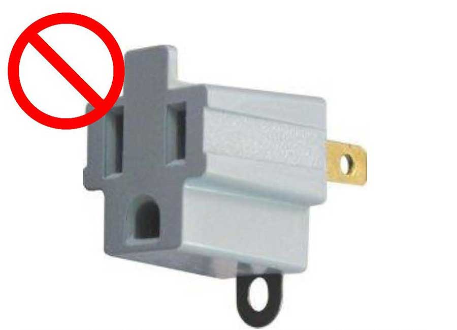 A prohibited 3 to 2-prong adapter