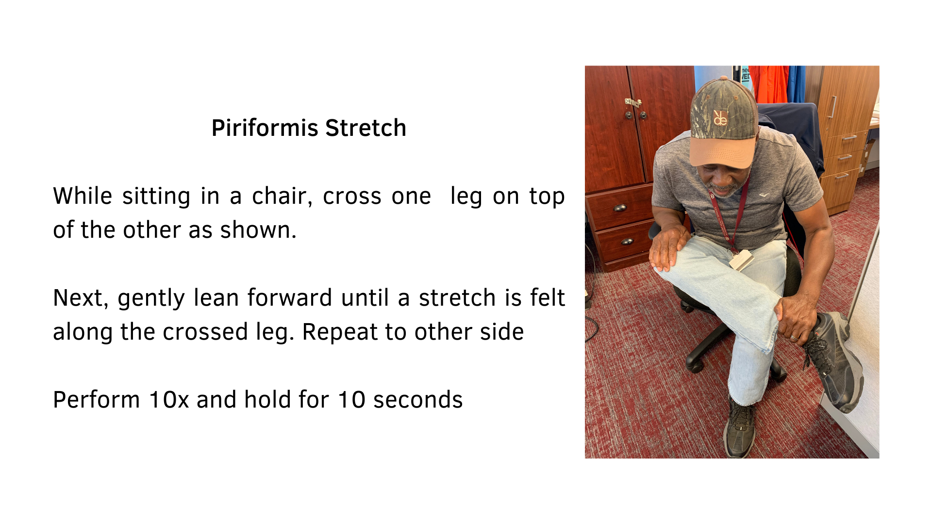 Black text on a white background that reads, "Piriformis Stretch: While sitting in a chair, cross one leg on top of the other as shown. Next, gently lean forward until a stretch is felt along the crossed leg. Repeat to the other side. Perform 10x and hold for 10 seconds." A photograph of a man sitting in a chair performing the stretch is included on the right side.