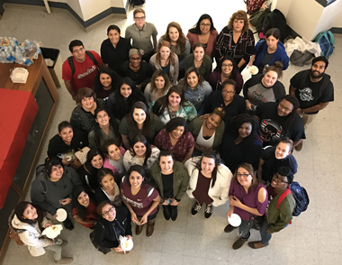 Group of students in the OMB atrium.