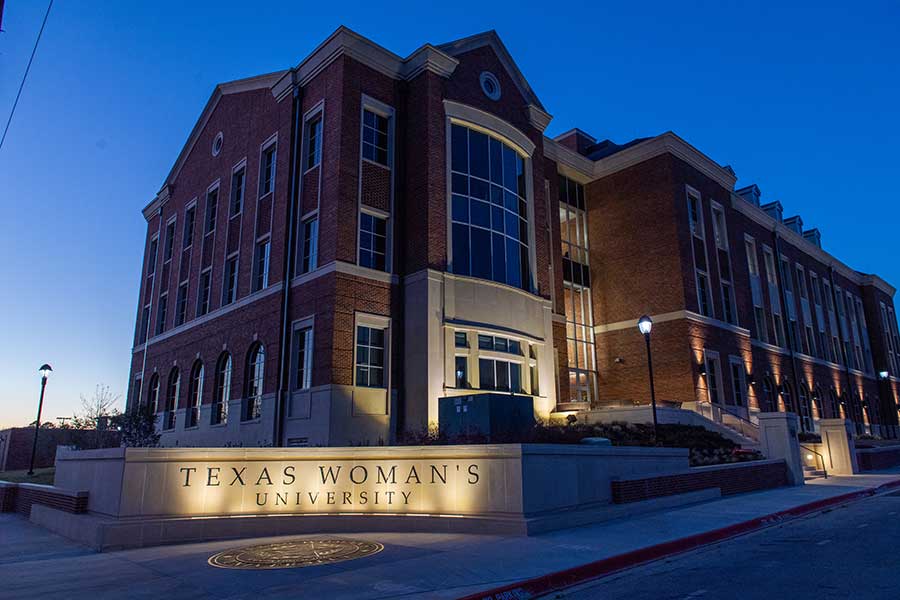 TWU's Scientific Research Commons on the Denton campus at dusk.