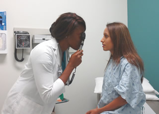 Nurse examining patient