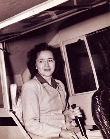 Emma Carter Browning, Texas Women's Hall of Fame Inductee 2016, in front of her airplane.