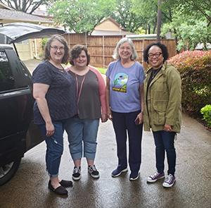 From left to right: Shelia Bickle, Bickle's daughter, Marcia Niemann, and Danielle Philllips-Cunningham.